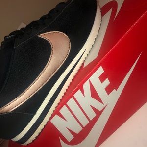 Black and rose gold Nike Cortez